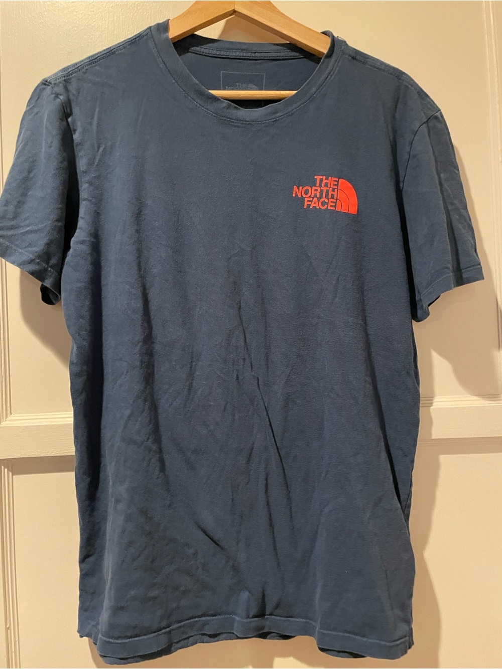 The North Face Men's Short Sleeve Tee in Navy with Orange Logo Small